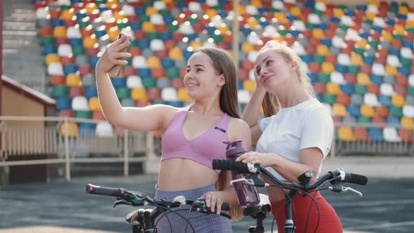 Happy Athlete Girls Doing Selfie Photo at a Stadium