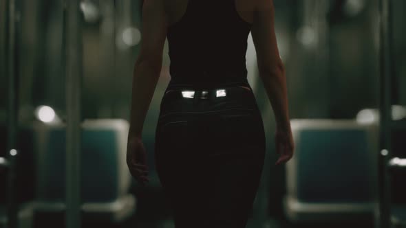 Slow Motion Young Woman in Metro alt