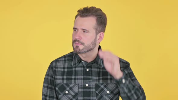 Portrait of Middle Aged Man Listening Carefully