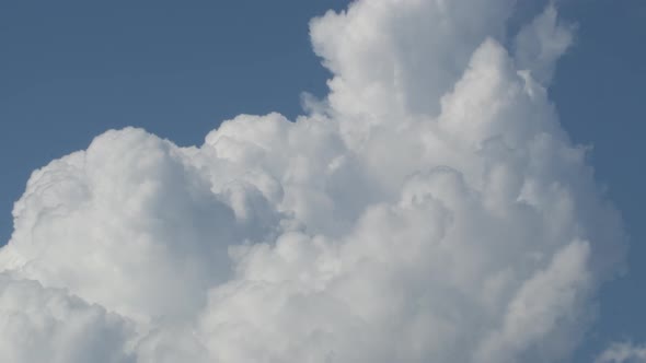 Clouds Moving in the Blue Sky