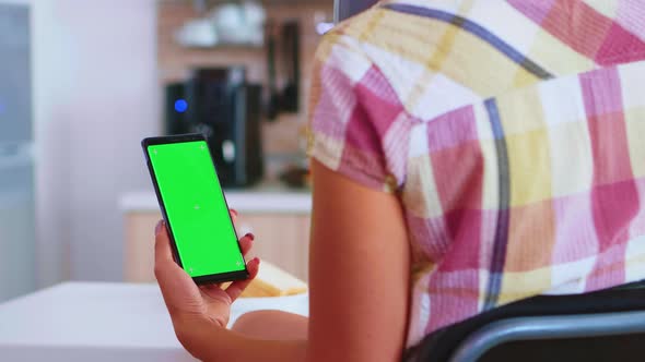 Woman Using Smartphone with Chroma Key