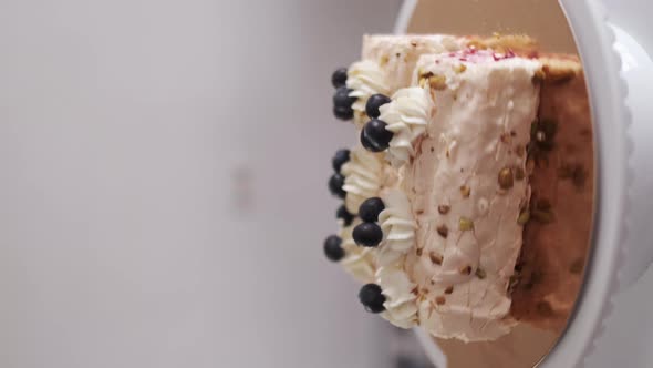 Vertical Shoot of Classic Delicious Dessert with Whipped Protein and Creamy Filling in Light