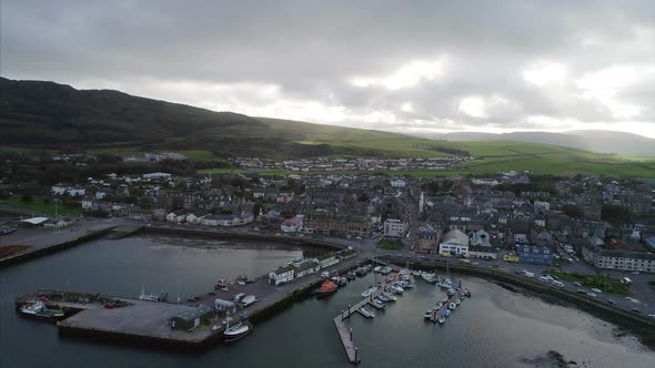 Panoramic shot of Campbeltown harbour with marina and docks and town