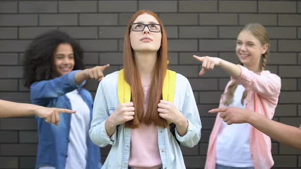 Red-Haired Schoolgirl Suffering Bullying, Students Pointing Fingers, Conflict