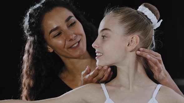 Brunette Adult Hispanic Woman Teacher Coach Helps Teenager Girl Child Rehearsing Dance Dancing Class