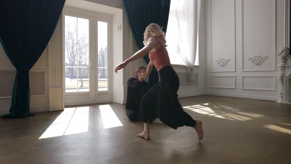 Emotional Dance of Two Young People Contemporary Choreography Dancers are Rehearsing