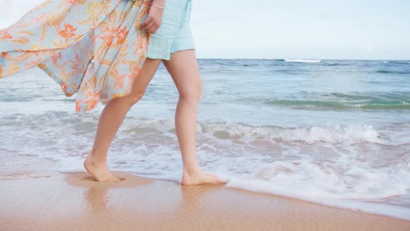 Woman in Colorful Beach Dress Waving By Sea Breeze Shore at Scenic Ocean Waves