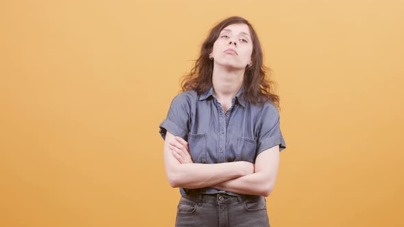 Young Woman Looking Bored and Desinterested of Something
