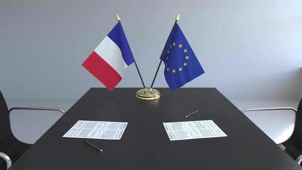 Flags of France and the European Union and Papers