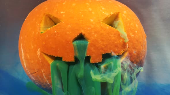 Special Green Paint Pours Covering Pumpkin Mouth and Nose