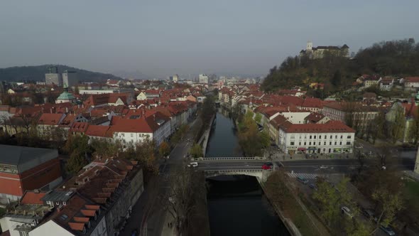 Aerial shot of Ljubljanica River and Dragon Bridge