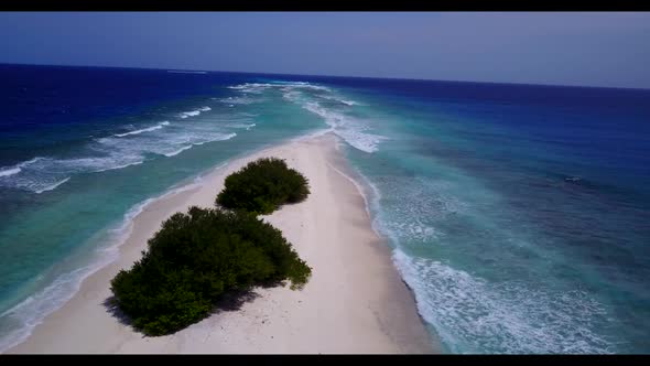 Aerial above panorama of relaxing island beach trip by clear ocean with white sandy background of a 