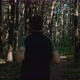 Following Shot of Young Fit Man Running in Forest - VideoHive Item for Sale