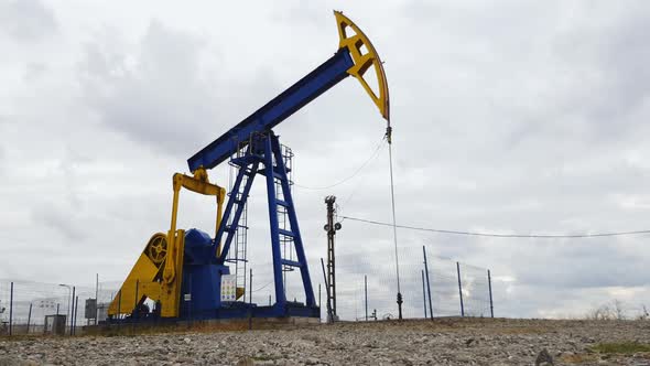 Oil pumpjack pumping sequentially oil from the ground near Ploiesti, Romania