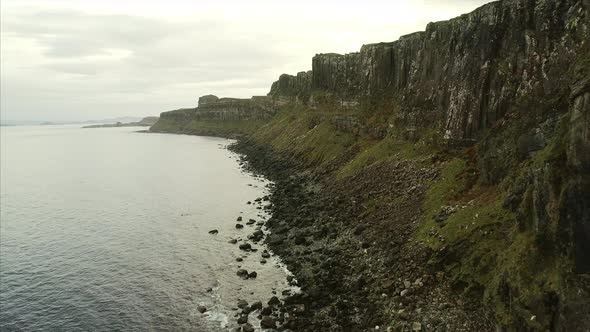 Flying by the Cliffs and Bay Near Neist Point in Skye Scotland