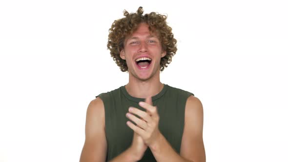 American Optimistic Curly Guy in Green Muscle Shirt Shouting Happily Clapping Showing Thumb Up Over