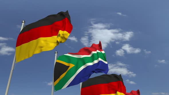 Row of Waving Flags of South Africa and Germany