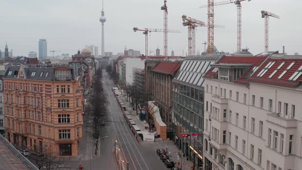 AERIAL: Slow Flight Through Empty Central Berlin Neighbourhood Street with Cathedrals and View on