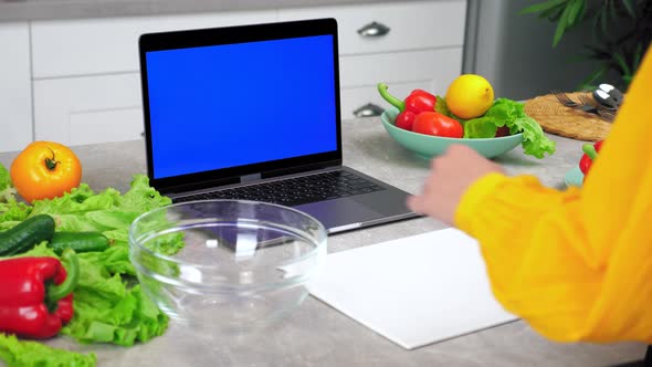 Woman Housewife in Kitchen Tells Chef Shows Ingredients for Cooking in Webcam