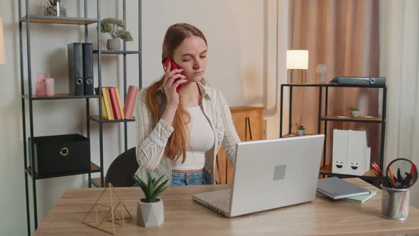 Young Woman Using Laptop Computer Sitting on Sofa Working Online Shopping From Home Office