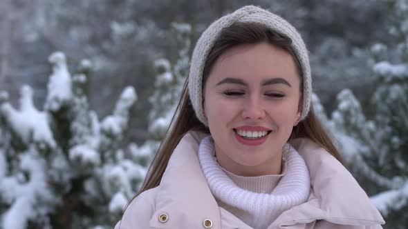 Young Attractive Woman Smiles