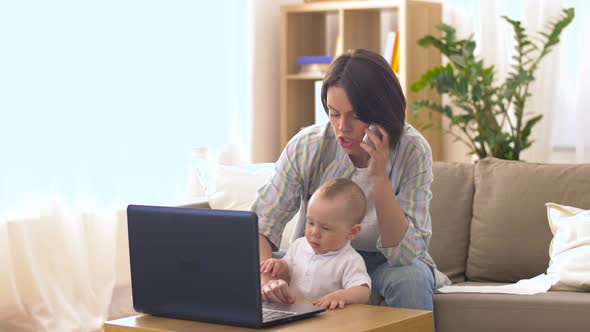 Working Mother with Baby Calling on Smartphone 