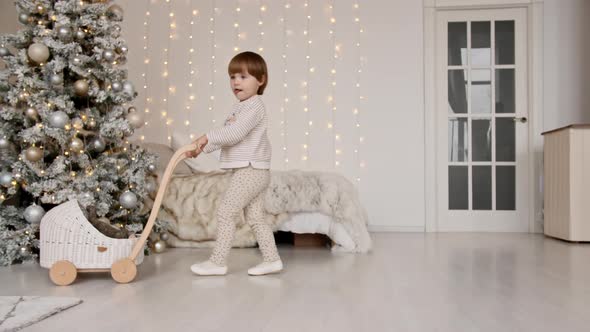 The Child Plays in the New Year's Interior