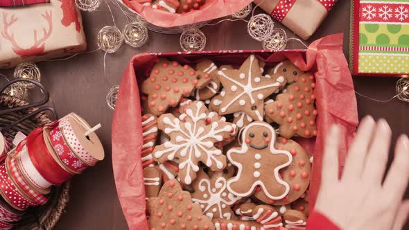 Packaging traditional home made gingerbread cookies as food gifts.