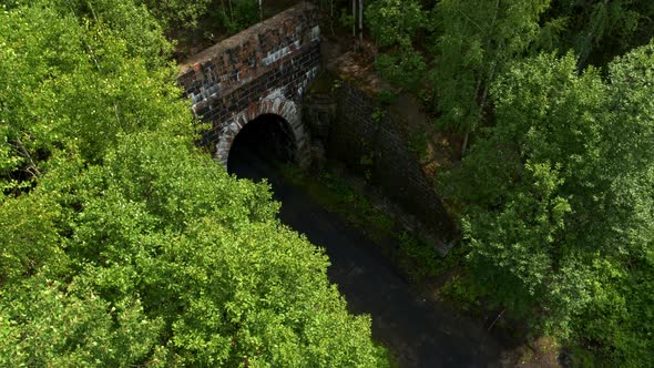 Aerial View of the Car Entering the Tunnel