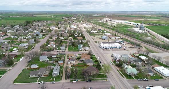 The historic town of Wheatland Wyoming in 2021 springtime green grass after snow melt and rains.