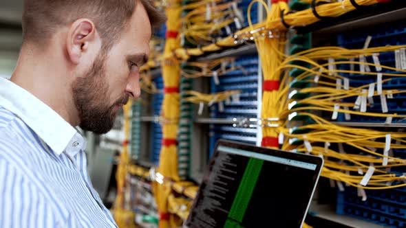 Engineer Working in Data Room