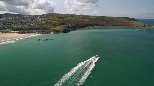 View of boat just off Porthminster Beach St Ives Cornwall England UK