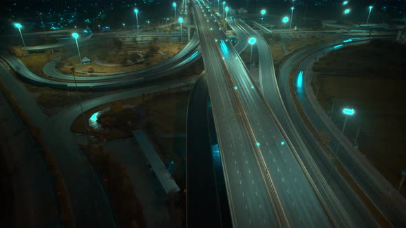 4K : Hyperlapse drone shot over highway multi-level junction road.