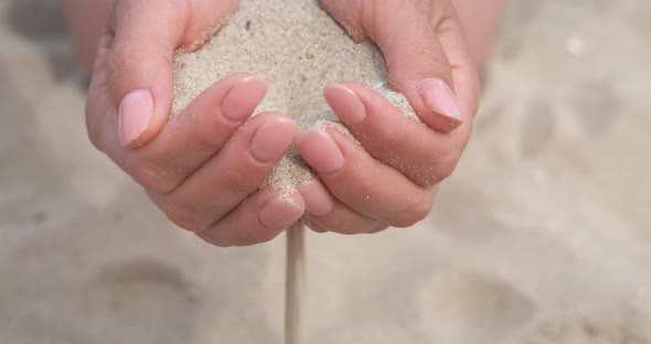 Spill Sand Between Fingers