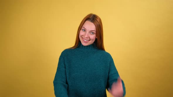 Young Red Hair Woman Posing Isolated on Yellow Color Background Studio