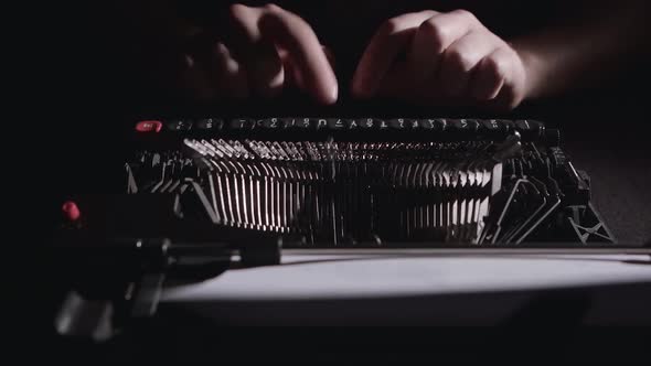 Poet Types the Text of the Poem on a Retro Typewriter