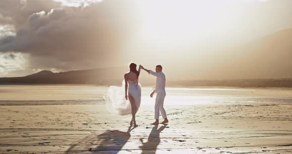 Dancing Beside the Beach Romantic Couple with