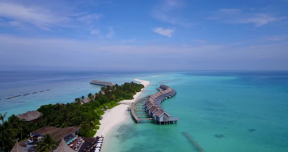 Luxury overhead abstract shot of a sunshine white sandy paradise beach and aqua blue water backgroun