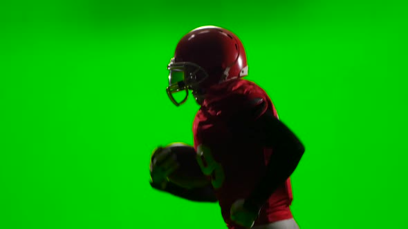 The Player Runs with the Ball in His Hand and Throws It. Green Screen