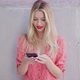 Cheerful Young Woman Using Smartphone - VideoHive Item for Sale