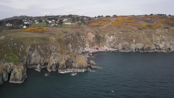 Walking Trail On Cliff Near Welton's Bay In Howth, Dublin, Ireland. aerial drone