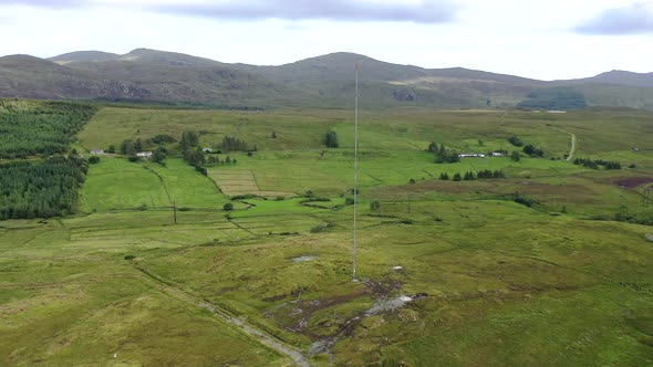 Aerial View of Transmitter Tower on an Agricultural Field in the Irish Highlands By Glenties in