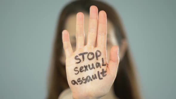 Stop Sexual Assault Phrase on Womans Hand