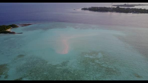 Aerial panorama of marine lagoon beach time by blue lagoon and bright sand background of a dayout ne