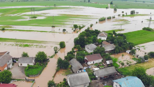 Aerial View Floods and Flooded Houses. Mass Natural Disasters and Destruction. A Big City Is Flooded