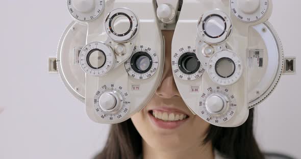 Woman doing eye test at the clinic 