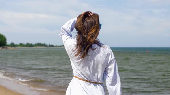 Happy Smiling Woman Walking Along Summer Beach 3