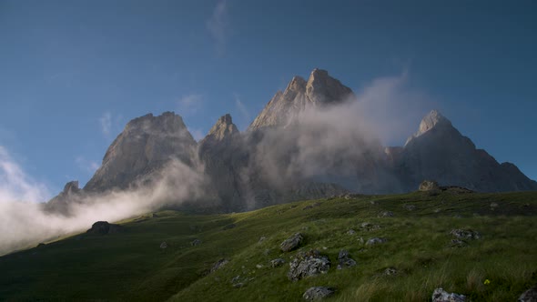 Summer Video Landscape Low Cloud Cover Flows Around Epic Cliffs on a Summer Evening at Sunset