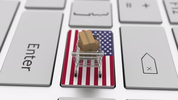 Keyboard Key with Flag of the USA and Shopping Cart with Cartons