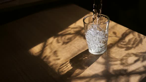 A Transparent Glass is Filled with Fresh Drinking Water